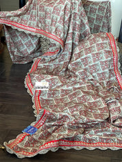 Designer Soft Silk - Beige Red Figurines Printed